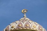 white concrete dome building under blue sky during daytime